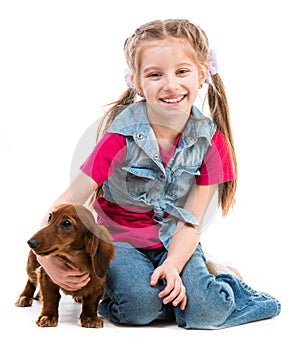 Little girl with dachshund