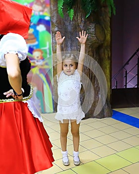 Little girl dancing at a children`s party