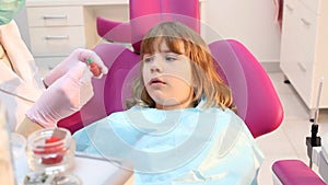 Little girl at the dentist