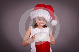 Little girl disappointed with her Christmas stocking