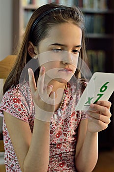 Little Hispanic Girl Doing MAth