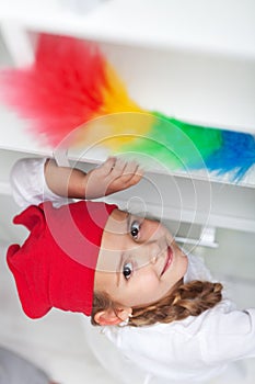 Little girl doing chores - dusting