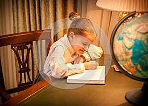 Little girl doing geography homework