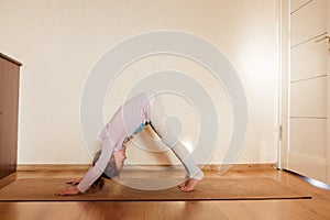 Little girl doing yoga