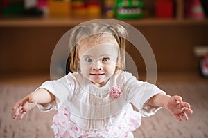 little girl with Down syndrome