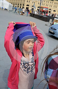 Little girl with down syndrome in the city