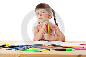 Little girl draw with crayons