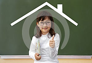 Little girl and drawn house