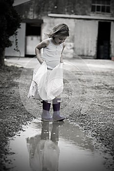 Little Girl in Dress and Wellies photo