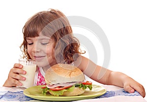 Little girl drink milk