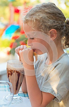 Little girl drinking.