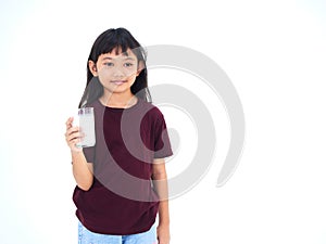 Little girl drinking milk on white background