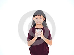 Little girl drinking milk on white background