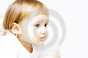 Little girl drinking water