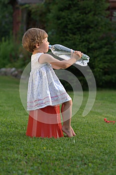 Little girl drinking water