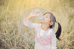 Little girl drinking water lifestyles