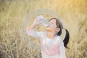 Little girl drinking water lifestyles