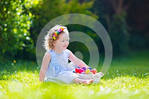 Little girl on Easter egg hunt