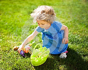 Little Girl on an Easter Egg hunt photo