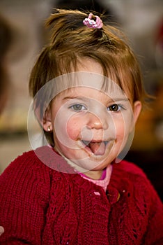 Little girl eating chocolate