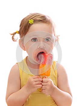 Little girl eating colorful icelolly