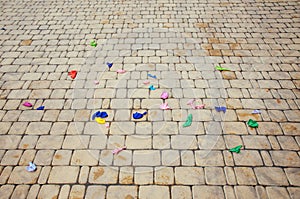 Background scattered burst balloons after the event, party, on the street road