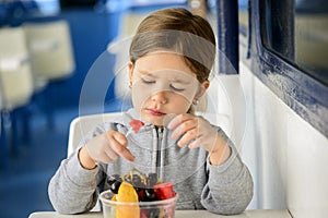 Little girl eating healthy snack