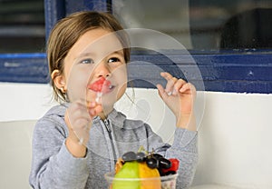 Little girl eating healthy snack