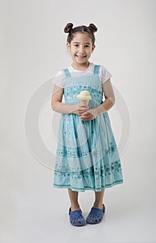 Little girl eating ice cream