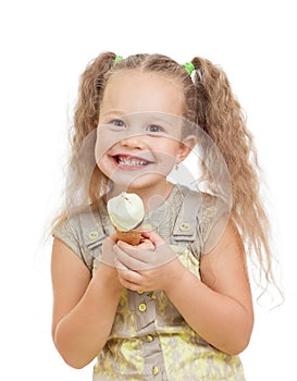 Little girl eating ice cream in studio isolated