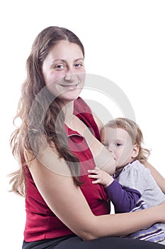 Little girl eating milk