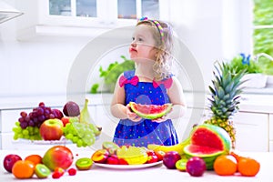 Little girl eating water melon