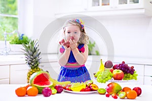 Little girl eating water melon