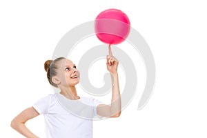 Little girl is engaged in fitness with a ball.