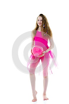 Little girl is engaged in fitness with a ball.