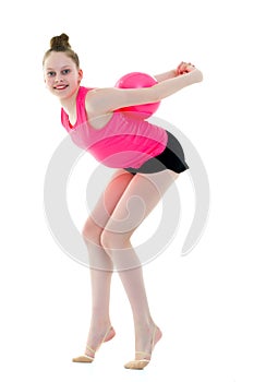 Little girl is engaged in fitness with a ball.