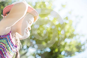 Little girl enjoy the sun and warm summer day