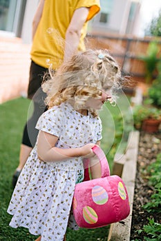 Little girl enjoying Easter Egg Hunt