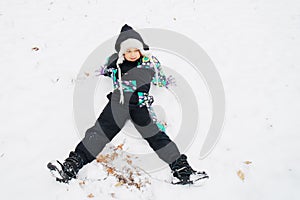 Little girl enjoying first snow