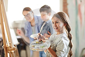 Little Girl Enjoying Painting