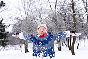 A little girl enjoying winter and snow