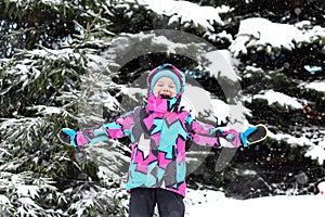 A little girl enjoying winter and snow