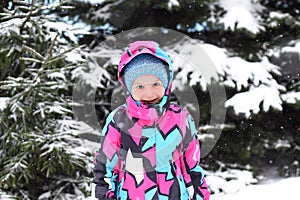 A little girl enjoying winter and snow