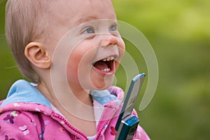 Little Girl Excited to Use Cell Phone