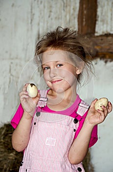 little girl with farm fresh eggs