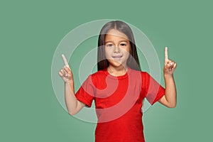 Little girl with fingers to the side