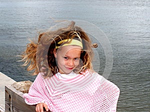 Little girl on fishing dock