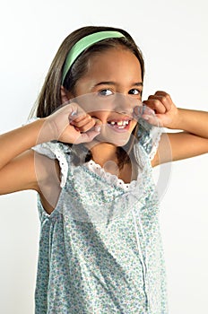 Little Girl Flossing her Teeth