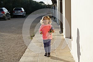 Little girl with flowers