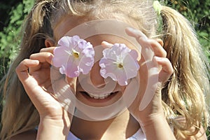 Little girl flowers on the eyes